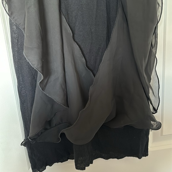 Black sleeveless top. Knit with chiffon ruffles. - Picture 4 of 4
